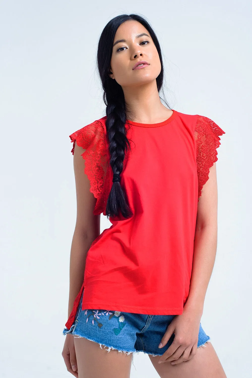 Red top with lace back and ruffles